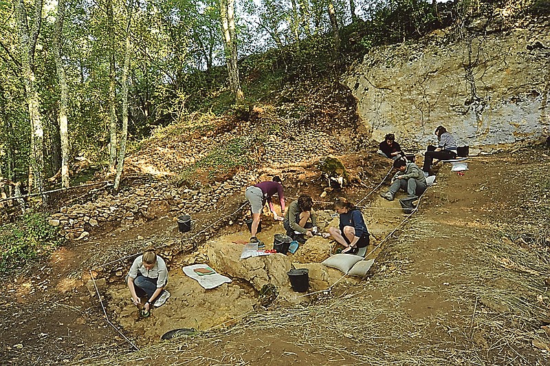People working at the excavation of the Neanderthal site of Abri Peyrony, southwestern France, where bone tools known as lissoirs, were recently discovered. Researchers have found what they say are the first examples of specialized bone tools made by Neanderthals, a discovery that will add to debates about how advanced Neanderthals were and how much contact they had with modern humans.