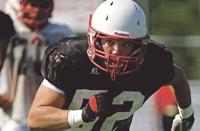 
Jefferson City linebacker Hayden Strobel sets his sights on a ballcarrier during tackling drills in the Jays' practice Saturday morning at Adkins Stadium.