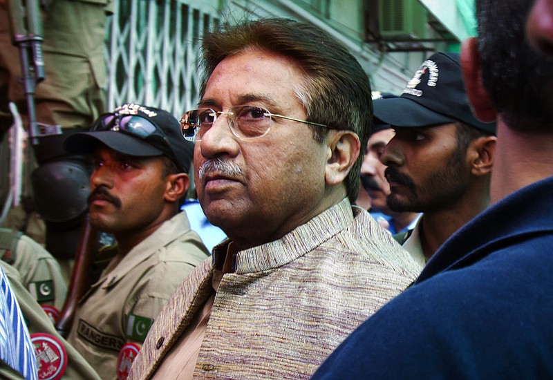 Pakistan's former President and military ruler Pervez Musharraf arrives April 20 at an anti-terrorism court in Islamabad, Pakistan. A Pakistani court Tuesday indicted Musharraf on murder charges in connection with the 2007 assassination of iconic Pakistani Prime Minister Benazir Bhutto, deepening the fall of a once-powerful figure who returned to the country this year in an effort to take part in elections.