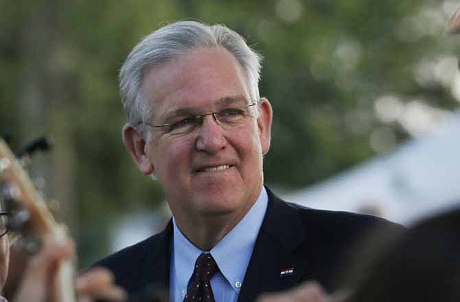 In this Aug. 15, 2013 file photo, Missouri Gov. Jay Nixon watches a performance at the Missouri State Fair in Sedalia.