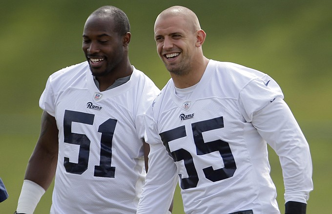 Rams linebackers Will Witherspoon (left) and James Laurinaitis laugh during training camp last Friday in St. Louis.