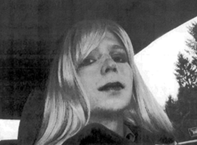 Pfc. Bradley Manning poses for a photo wearing a wig and lipstick. Manning plans to live as a woman named Chelsea and wants to begin hormone therapy as soon as possible.