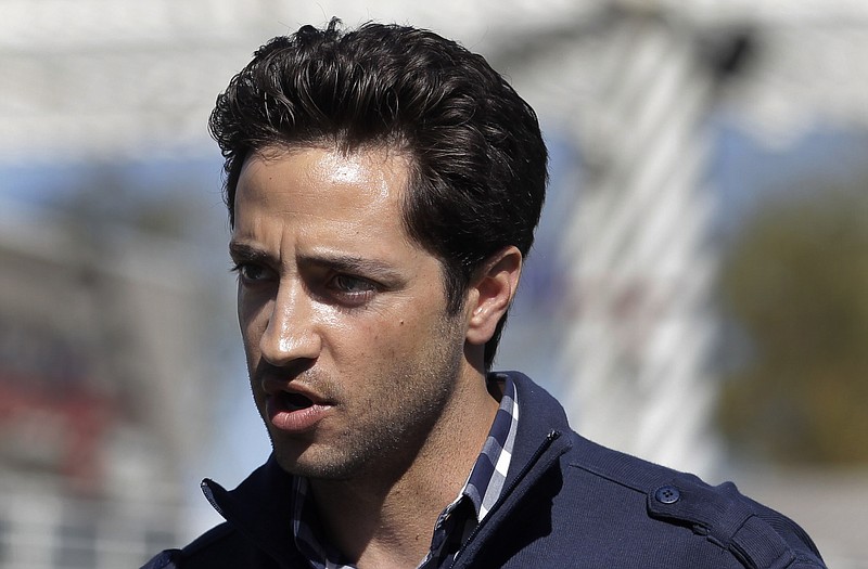 Ryan Braun speaks during a news conference at the Brewers' spring-training complex in Phoenix in this Feb. 24, 2012, file photo. At that time, Braun proclaimed he was innocent of using a banned substance. However, he finally admitted his guilt Thursday.