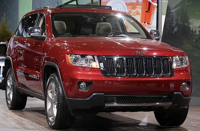 This Feb. 8, 2012, file photo, shows a Jeep Grand Cherokee during the media preview of the Chicago Auto Show at McCormick Place in Chicago.