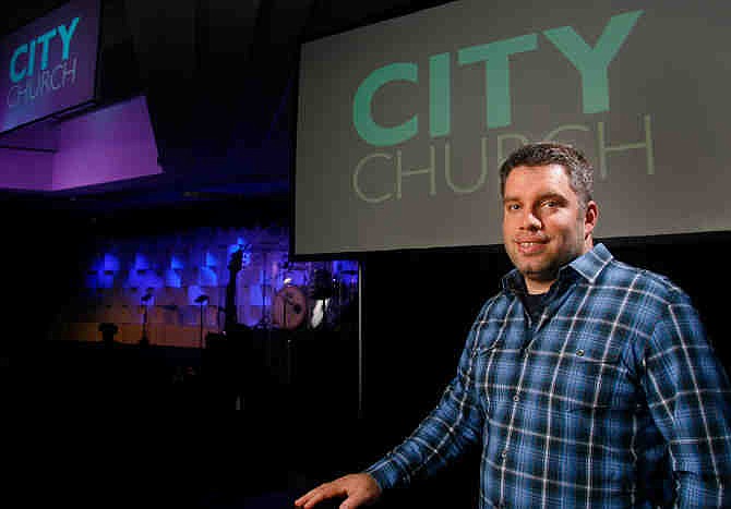 City Church of Tallahassee Pastor Dean Inserra stands inside his church in Tallahassee, Fla. on Tuesday, Aug. 20, 2013. Inserra's church is researching how they will address the changing attitudes to gay marriage in the courts as well as among the public. "We have some gay couples that attend our church. What happens when they ask us to do their wedding?" Inserra said. "What happens when we say no? Is it going to be treated like a civil rights thing?"