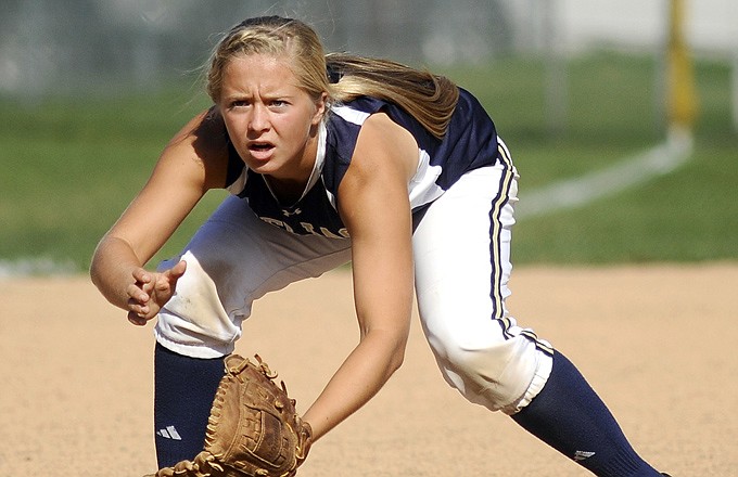 Helias third baseman Paige Bange gets into fielding position during a game last season.