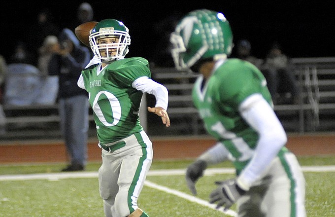 Blair Oaks quarterback Jordan Hair gets ready to throw a screen pass to Dominic Jamerson during a game against Tolton-Calvary last season at the Falcon Athletic Complex. Hair and Jamerson figure to be main cogs in the Blair Oaks offensive attack this season.