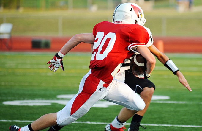 Logan Hirst of Tipton looks for running room during Friday's Jamboree in Wardsville.