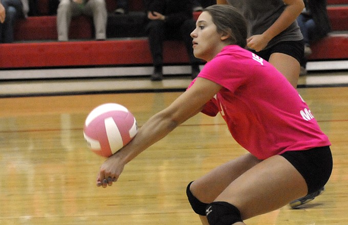 Jefferson City's Abbi McKnelly digs a ball during a game last year against Hickman. McKnelly is a retuning all-state performer from last season.