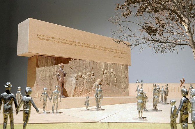 This handout image courtesy of Gehry Partners, LLP, 2013 shows the planned Dwight D. Eisenhower Memorial in Washington. President Barack Obama is appointing a critic of the planned Dwight D. Eisenhower Memorial design to serve on the federal commission that oversees the project's development, weighing into a lingering debate over the memorial's future. The White House announced Obama's plan to appoint former National Endowment for the Humanities chairman Bruce Cole last month, but it drew little attention while Congress was in recess. Cole has published at least two articles in the past 13 months criticizing architect Frank Gehry's approach to the memorial design, saying it would be a "monumental farce" and that the design is "a cross between an amusement park and a golf course." 