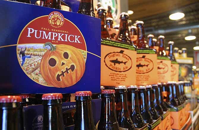 This Friday, Aug. 30, 2013 photo shows pumpkin beers on display for sale at a Whole Foods Market in Richmond, Va.