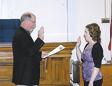 Rep. David Wood, Versailles, officiates at the swearing in of Moniteau County Assessor Melissa Hentges Thursday, Aug. 29. 