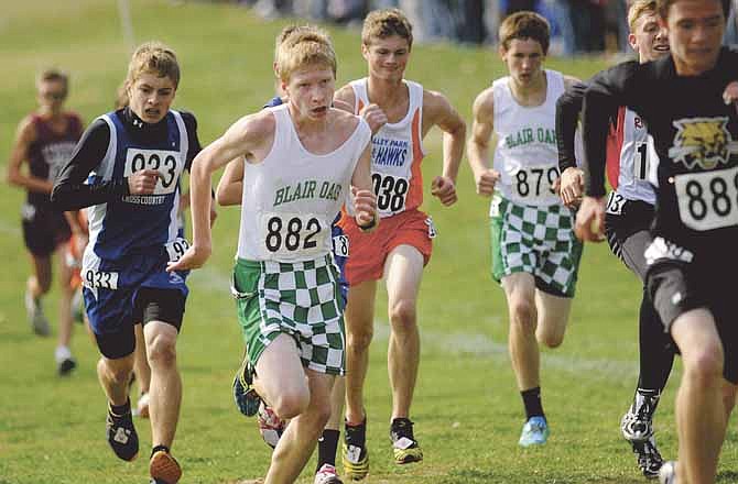 
Blair Oaks' Nick Yaeger (center) sprints to the finish line during last year's state meet at Oak Hills Golf Center in Jefferson City. He is back as a junior in 2013.