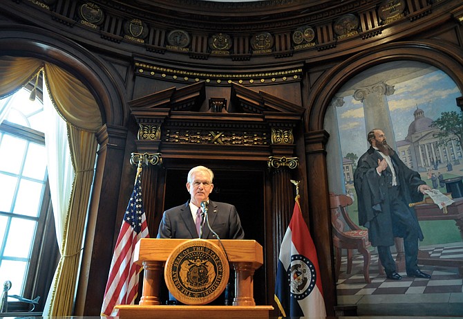Gov. Jay Nixon delivers one of his veto messages in a July news conference.