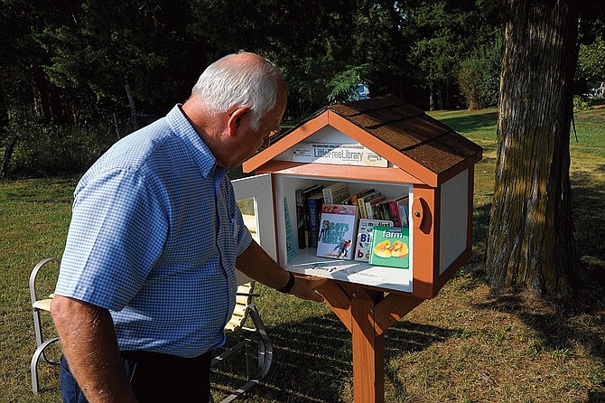 A Little Free Library will open today in Russellville, joining more than 9,000 sites in 50 states and more than 30 nations. Eugene and Gladys Moll have stocked the outdoor kiosk and hope to see their neighbors borrow and drop off books in the future.