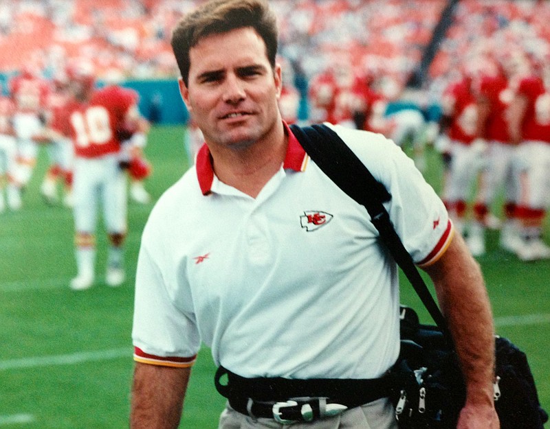 Dr. Michael Monaco works the sidelines at a Chiefs game in Kansas City.