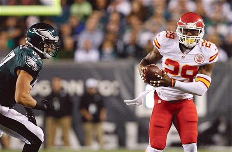 Chiefs safety Eric Berry intercepts a pass during Thursday's game against the Eagles in Philadelphia.