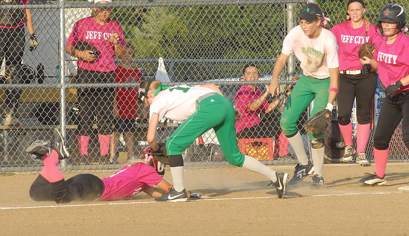 Blair Oaks third baseman Lauren Viessman tags Jefferson City's Katie Tambke after she got caught in a rundown during the fourth inning of Thursday's game at the American Legion Sports Complex.