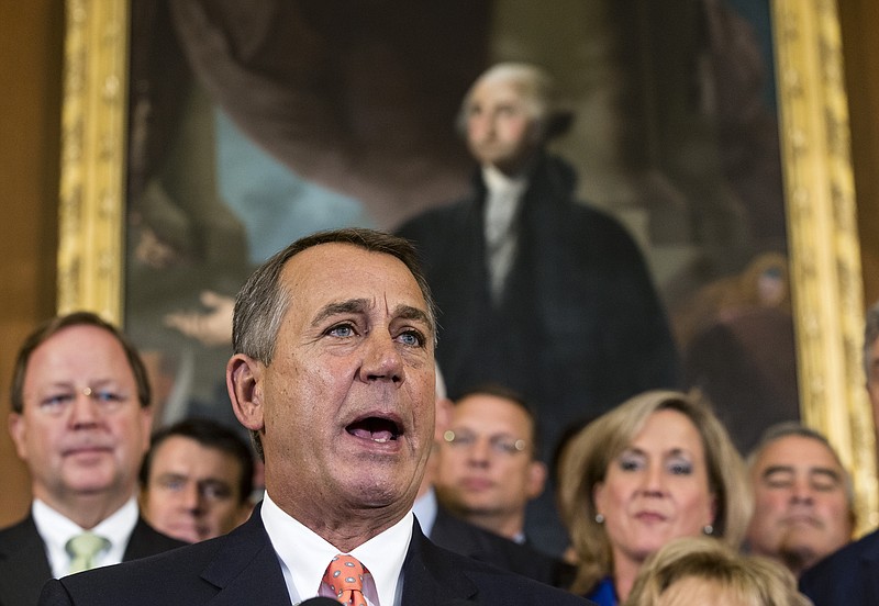 Speaker of the House John Boehner, R-Ohio, and Republican members of the House of Representatives rally Friday after passing a bill that would fund the government for three months while crippling the health care law that was the signature accomplishment of President Barack Obama's first term, at the Capitol in Washington. Senate Majority Leader Harry Reid, D-Nev., has pronounced the bill dead on arrival and calls the House exercise a "waste of time."