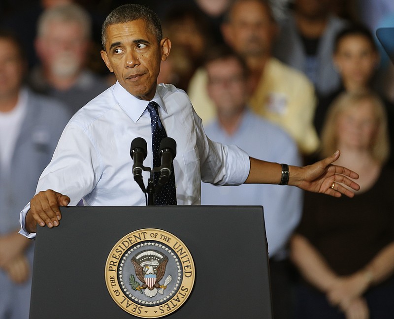 President Barack Obama gestures as he speaks to workers Friday at the Ford Kansas City Stamping Plant in Liberty. Obama traveled to the Kansas City area to visit the Ford automotive plant to highlight the progress in the economy since the 2008 financial crisis.