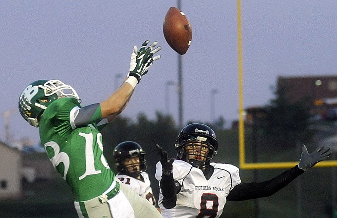 Blair Oaks' Mike Drehle breaks up a pass intended for Southern Boone's Grant Anderson on Friday night in Wardsville.