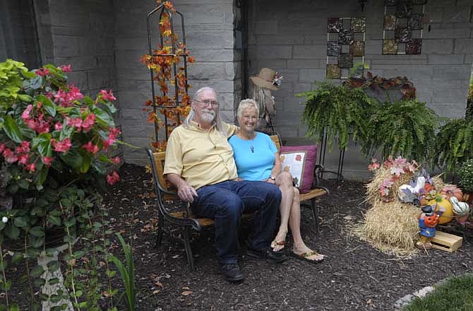 
Dana and Karen Basel have worked hard this season to re-create their front yard after foundation work removed a 10-foot deep perimeter around the home. 
