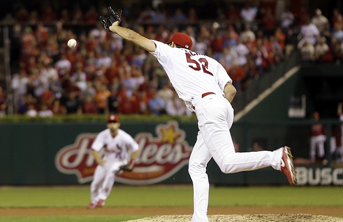 Cardinals starting pitcher Michael Wacha cannot reach an infield single by Ryan Zimmerman of the Nationals to break up his no-hitter with two outs during the ninth inning Tuesday night at Busch Stadium.