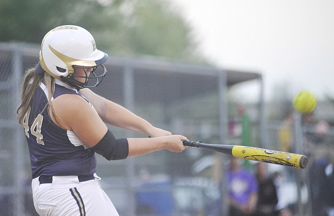 Peyton Hall of Helias homers in the second inning of Wednesday's game against Hickman at Duensing Field.