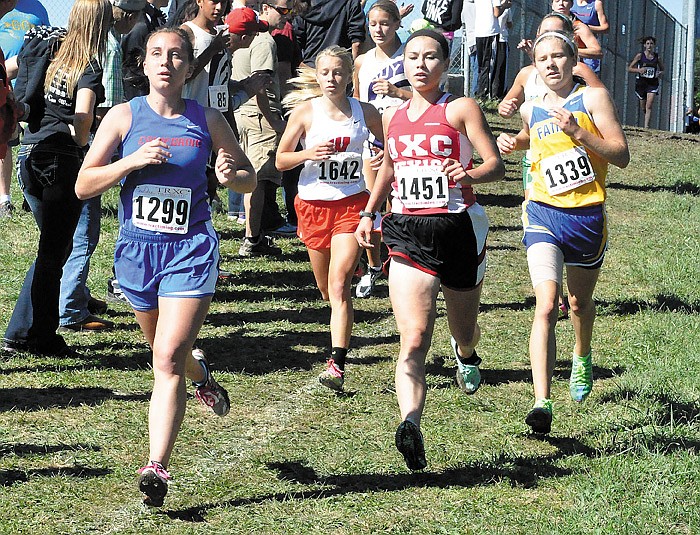 California's Leah Korenberg, far left, medaled by placing 13th at the Fulton Invitational Saturday with 21:16.