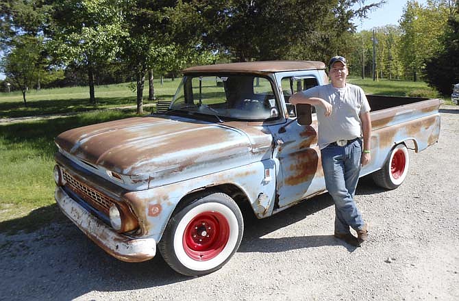 Clayton White, 20, of Russellville, will be presented with a $1,000 scholarship from the Mid-Mo Old Car Club at Saturday's car show in Jefferson City. White is a club member.