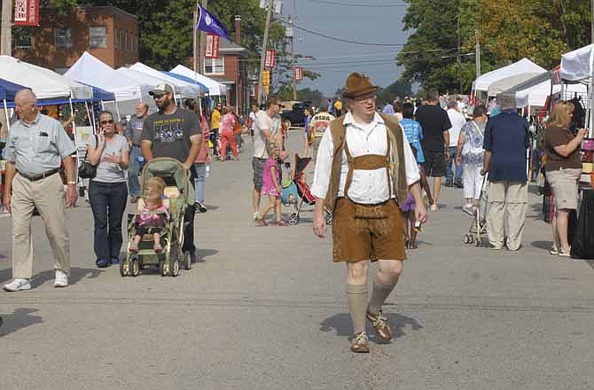 The streets along and intersecting Dunklin in Jefferson City's Old Munichberg district were lined with craft and food vendors as the annual Oktoberfest was in full swing on Saturday. 