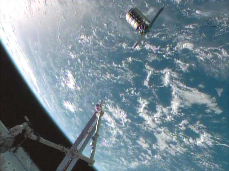 This image provided by NASA-TV shows the Cygnus spacecraft at the 30-meter hold point from the International Space Station as both cross over the Atlantic Ocean.