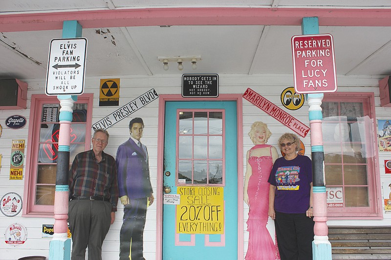 Owners Ron and Judi Dunwoody pose with two of the "stars" of NostalgiaVille, Elvis and Marilyn Monroe. The popular roadside attraction in Kingdom City will close its doors this year, as the business becomes an online-only vendor of '50s-themed clothes and party supplies.