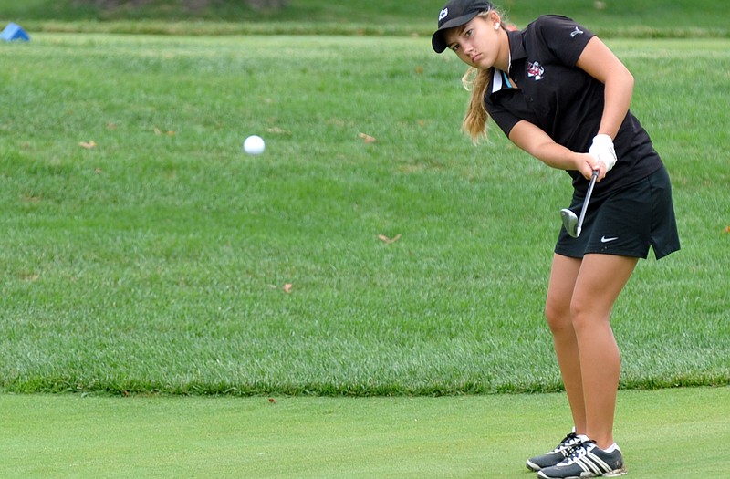 Jefferson City's Brooke Thompson chips onto the eighth hole during Monday's Capital City Invitational at the Jefferson City Country Club. Thompson was the medalist with a 77.
