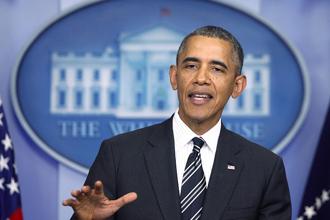 President Barack Obama makes a statement in the James Brady Press Briefing Room at the White House in Washington, after he spoke with Iranian President Hassan Rouhani in late September. Congress generally backs Obama's new outreach to Iran, but with tougher U.S. economic sanctions against Tehran on the way, the president's diplomatic task will only get harder if he doesn't make quick progress.