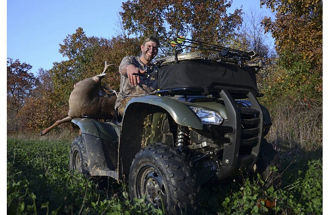 Few tools are as useful for hunters as an ATV. Jason Heath hauls deer out of the woods on his.