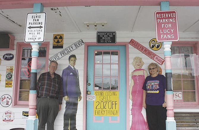 
Owners Ron and Judi Dunwoody pose with two of the "stars" of NostalgiaVille, Elvis and Marilyn Monroe. The popular roadside attraction in Kingdom City will close its doors this year, as the business becomes an online-only vendor of '50s-themed clothes and party supplies.