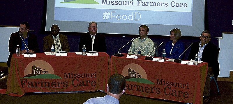 Democrat photo / David A. Wilson
Panelists discussing conventional and organic agriculture at the Sept. 19 conference are, from left: Dan Shaul, State Director of Missouri Grocer's Association; Fanson Kidwaro, Ph.D., University of Central Missouri, Warrenburg, Department Chair of Agriculture; Jim Thomas, vegetable farmer and chairman and past president of Missouri Organic Association; Dr. Kevin Wells, Assistant Professor of Genetics, University of Missouri; Jennifer Polniak, Clinical Dietitian and Diabetes Educator at Boone Hospital Center; and Blake Hurst, farmer and President of Missouri Farm Bureau.