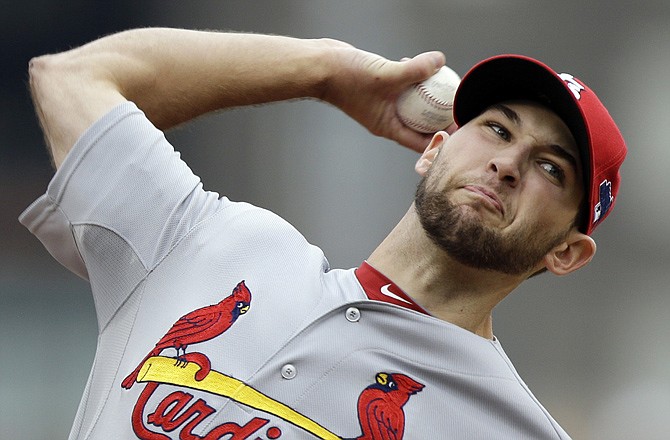 Michael Wacha took a no-hitter into the eighth inning Monday to lead the Cardinals to a 2-1 victory against the Pirates in Pittsburgh.