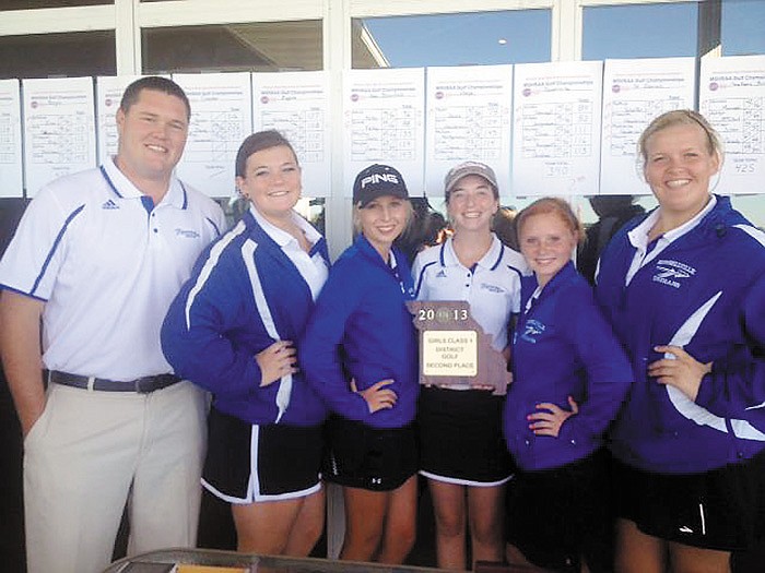 The Lady Indians proudly display the trophy they earned for placing second at the Class 1 District 2 Golf Tournament Monday at Redfield Golf Course, Eugene. From left are Coach Zane Garr, Chantz Grellner, Mikala Jungmeyer, Kelsey Schrimpf, Madison Oliver and Madie Bungart. Russellville advances as a team to Class 1 District 2 Sectionals Monday at Crescent Farms Golf Course, St. Louis. 
