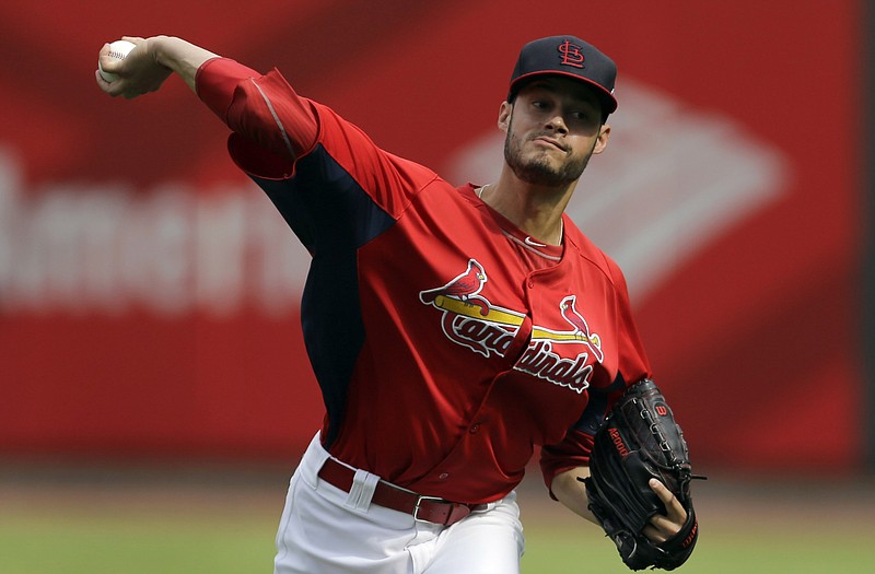 Cardinals pitcher Joe Kelly throws during practice Thursday at Busch Stadium. Kelly will get the start tonight against the Dodgers in Game 1 of the NLCS.