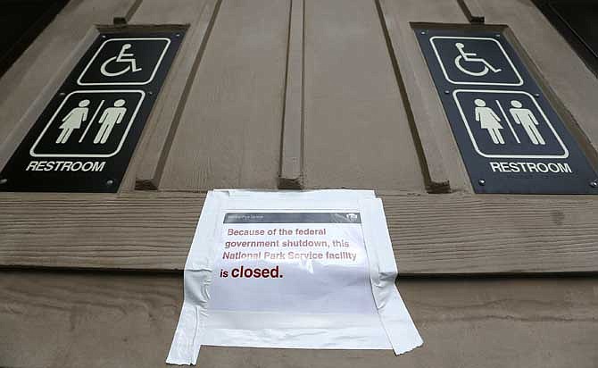 Even the bathrooms at the main entrance to Grand Canyon National Park remain closed to visitors on Thursday Oct. 10, 2013, in Grand Canyon, Ariz. Under pressure from several governors, the Obama administration said Thursday it will allow some shuttered national parks to reopen - as long as states use their own money to pay for park operations.