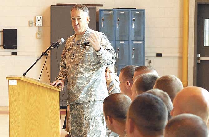 Major General Stephan L. Danner addresses the members of the Missouri National Guard Detachment 40, OSACOM (TF ODIN) Saturday morning at their departure ceremony at the Jefferson City Armory-Aviation Flight Facility. 