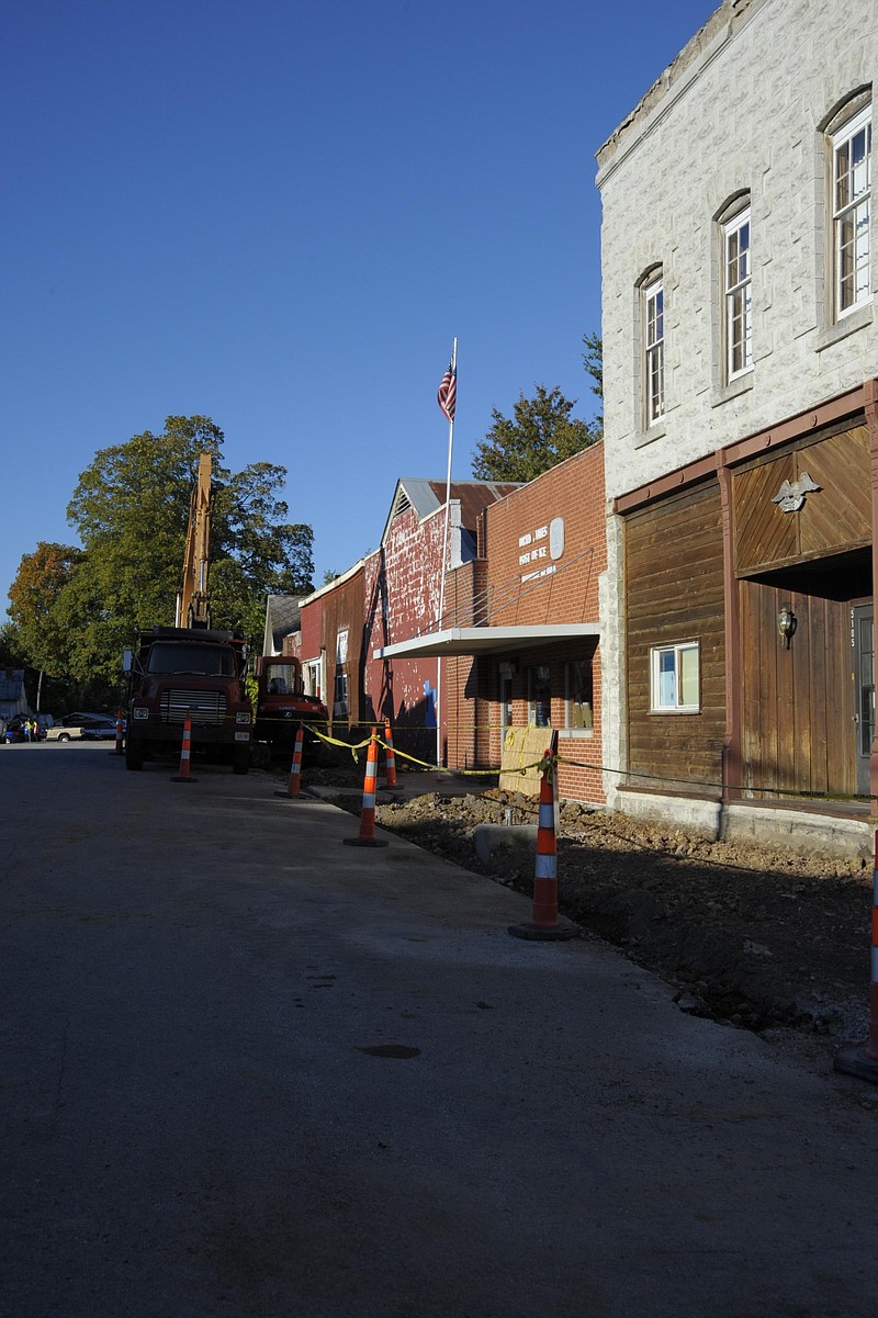 The sidewalk along Simpson Street in front of the U.S. Post Office is being replaced as part of the Safe Routes to Schools Missouri Department of Transportation grant project, awarded to the city of Russellville in 2011. Democrat photo/Michelle Brooks