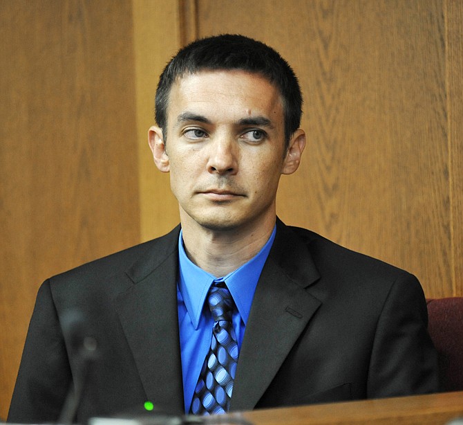 Defendant Christopher Knehans looks to the judge as he answers a series of questions in Circuit Court in February. He now faces a federal lawsuit filed by the victim.