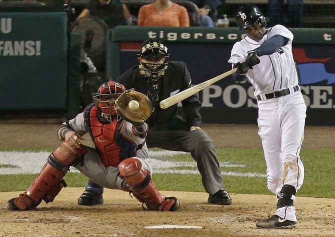 Detroit Tigers' Austin Jackson hits an infield single in the fourth inning during Game 4 of the American League baseball championship series against the Boston Red Sox, Wednesday, Oct. 16, 2013, in Detroit. 