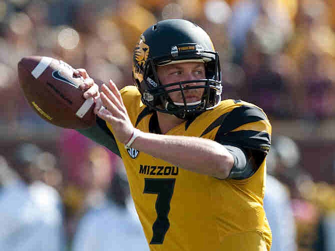 Missouri quarterback Maty Mauk throws a pass during the first quarter of an NCAA college football game against Florida Saturday, Oct. 19, 2013, in Columbia, Mo. 