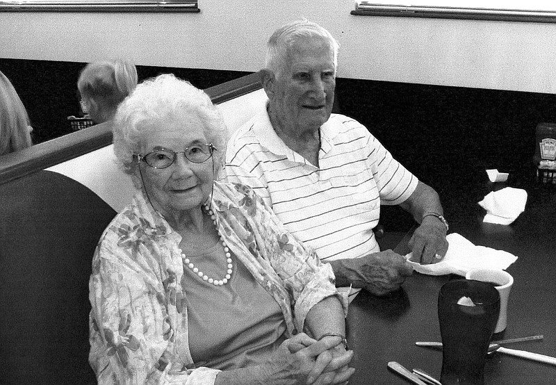 Local veteran Ruth Buell served in the Women Accepted for Volunteer Service (WAVES) program, inset at left, during World War II. She is pictured above with her late husband, Bob Buell, who served in the Army Air Corps during World War II. 