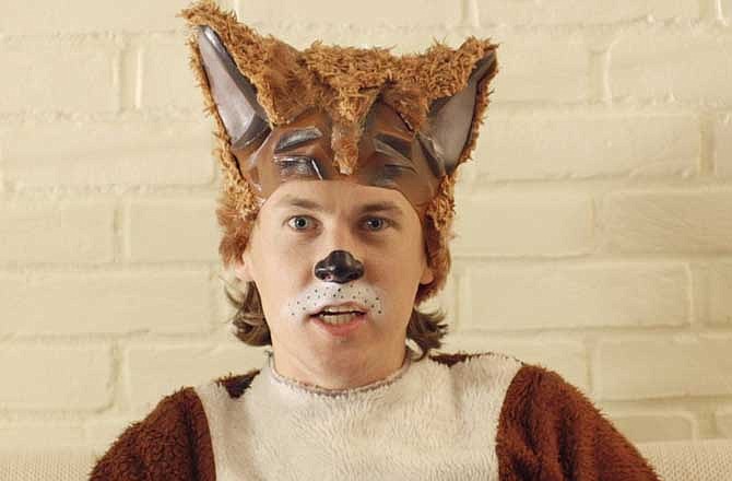 This image released by TVNorge/Concorde shows Bard Ylvisaker, who along with his brother, Vegard Ylvisaker, are known as Ylvis (ILL-vis), as he sings the opening lyric "What Does the Fox Say?". The funny brothers elevated the woodland creature in their video, "The Fox (What Does the Fox Say?)" in early September and have scored more than 150 million YouTube views of them prancing in fox suits singing: "Ring-ding-ding-ding-dingeringeding! Gering-ding-ding-ding-dingeringeding!" 