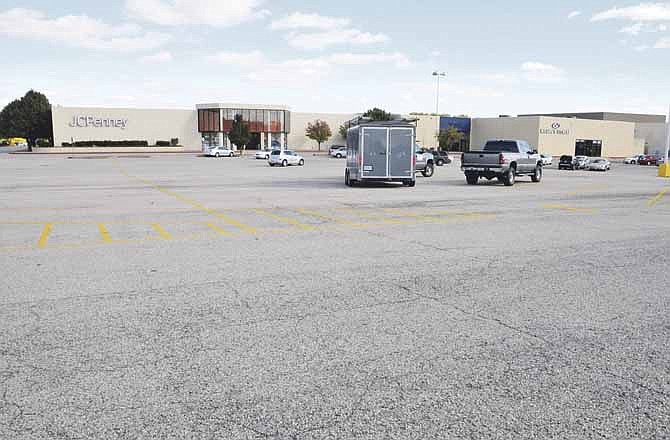 Resurfacing of the parking lot at the Capital Mall is on the list of priorities of making updates, repairs and renovations at the aging retail facility.